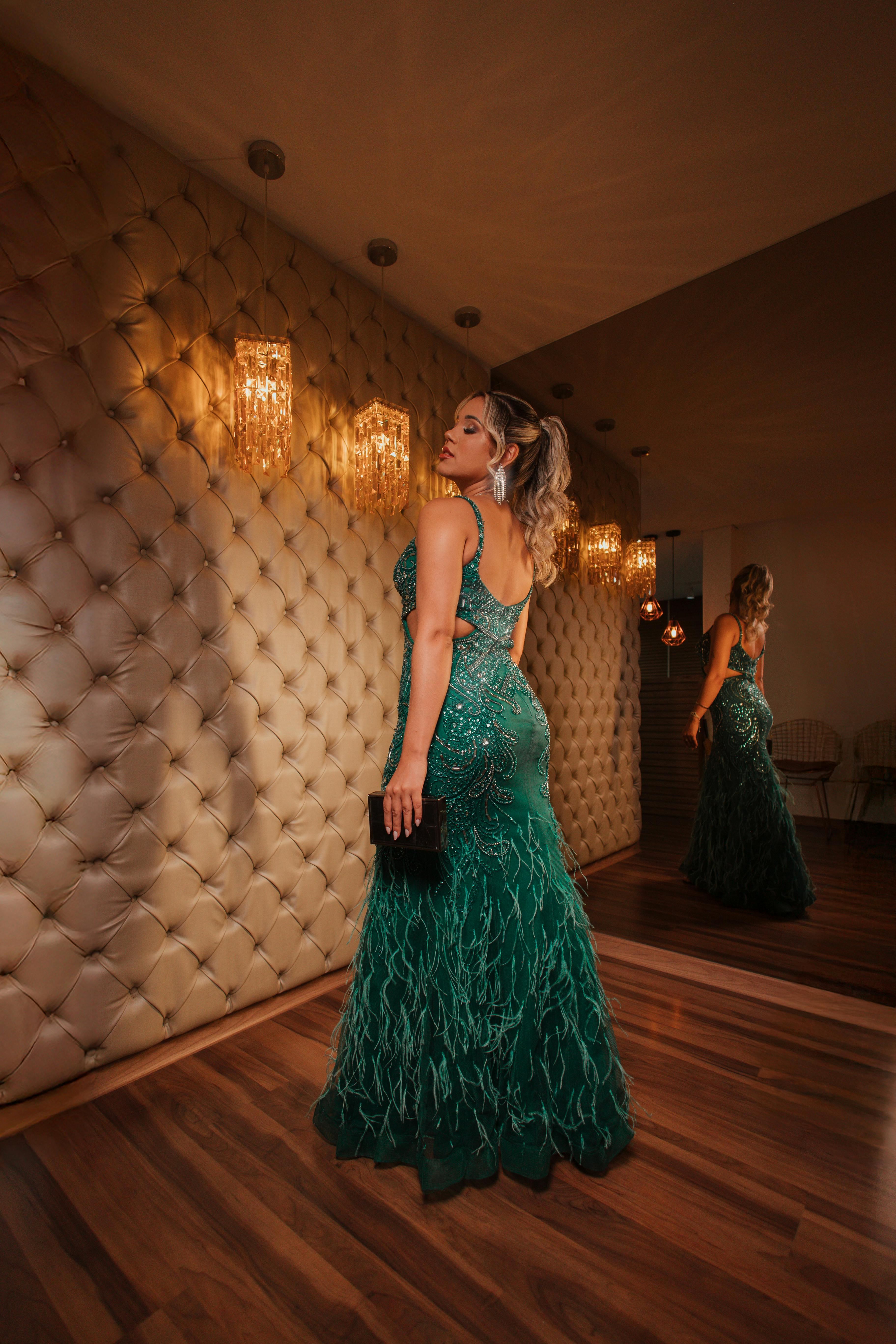 Emerald halter gown on model, editorial